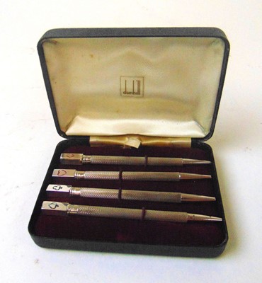 Lot 412 - A cased set of four Dunhill gaming pencils,...