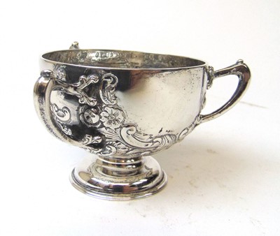 Lot 414 - An Edwardian silver three-handled bowl...