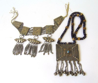 Lot 270 - A white metal Omani Hirz necklace together...