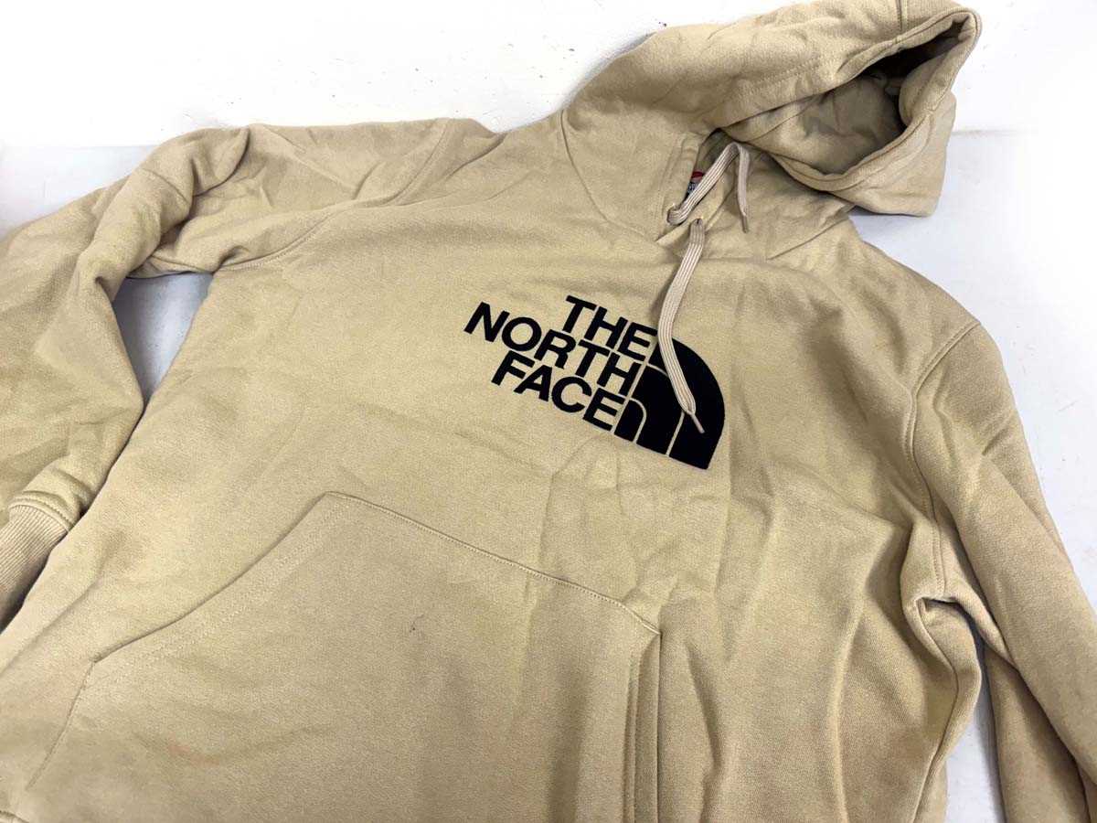 Lot 1014 - Mens The North Face hoodie in beige size XL...