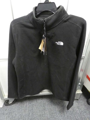 Lot 1269 - A women's North Face quarter zip fleece in...