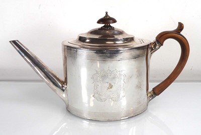 Lot 410 - A George III silver teapot of plain form,...