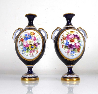 Lot 301 - A pair of Royal Worcester two handled vases of...