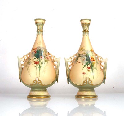 Lot 303 - A pair of Royal Worcester two handled ivory...