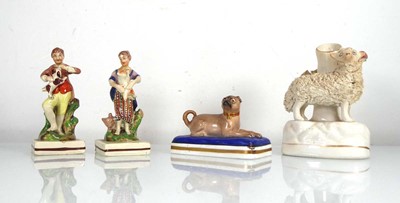 Lot 314 - A Samson type figure modelled as a seated pug,...