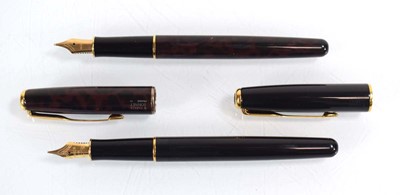 Lot 107 - A case containing two Parker 'Sonnet' fountain...