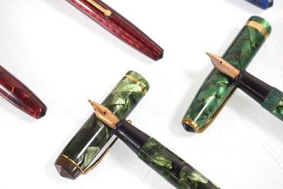 Lot 117 - A group of eight Conway Stewart fountain pens...