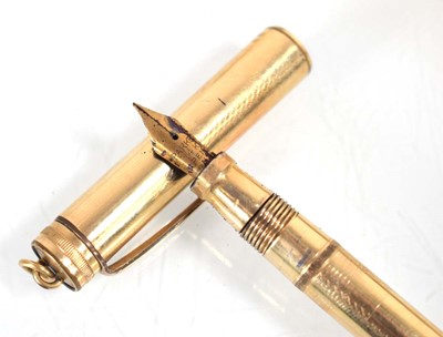 Lot 128 - A group of three Parker fountain pens with...