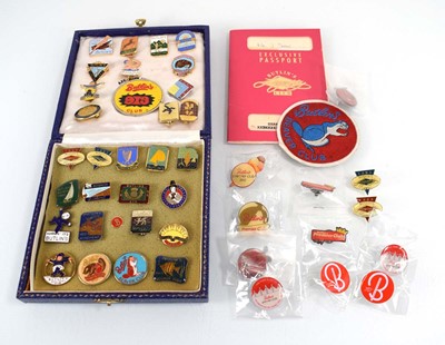 Lot 144 - A group of Butlins badges, 1940's to 2010's,...