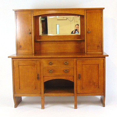 Lot 42 - An oak Arts and Crafts dresser labelled for...