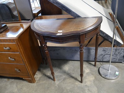 Lot 1046 - Mahogany demi-lune table with brown leather...