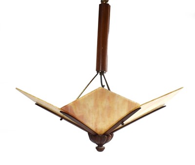 Lot 93 - A 1970's teak and glass ceiling light in the...