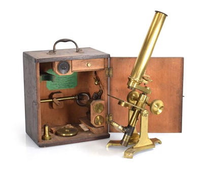 Lot 91 - A 19th century brass microscope by Newton & Co....