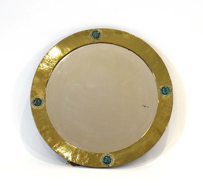 Lot 5 - An Arts & Crafts circular wall mirror, the...