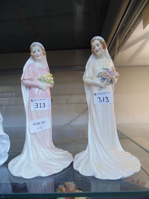 Lot 313 - Two Royal Doulton ceramic figurines 'The Bride'...