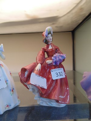 Lot 332 - A Royal Doulton ceramic figurine 'Lilac Time'...