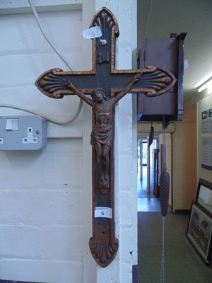 Lot 6 - A wall mounted cast metal crucifix