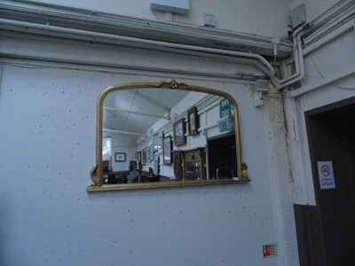 Lot 33 - A reproduction gilt painted over mantle mirror