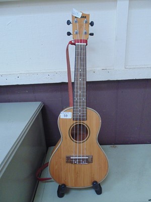 Lot 59 - A ukulele by Moselele