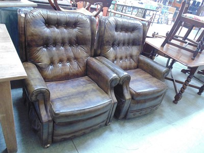 Lot 67 - A pair of faux leather upholstered reclining...