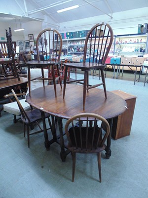 Lot 71 - A stained possibly Ercol drop leaf table with...