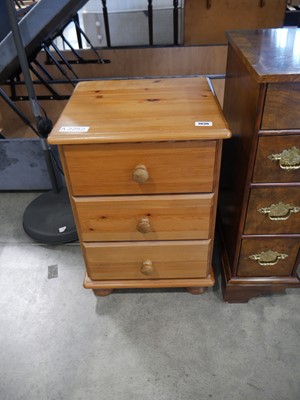 Lot 1036 - 3 drawer pine bedside cabinet