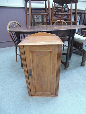 Lot 77 - A late Victorian walnut pot cupboard