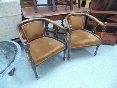 Lot 80 - A pair of early 20th century tub chairs