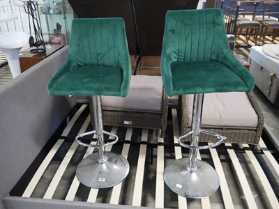 Lot 1042 - 2 bar stools with a green velvet cloth