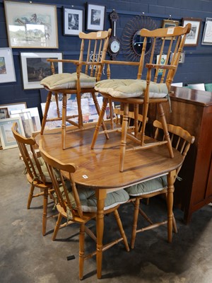 Lot 1071 - Wood effect extending table with 6 chairs...