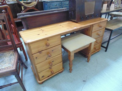 Lot 97 - A modern pine twin pedestal dressing table...