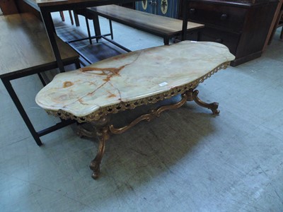 Lot 102 - A green onyx topped table on gilt metal base