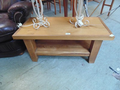 Lot 104 - A modern solid oak rectangular coffee table...