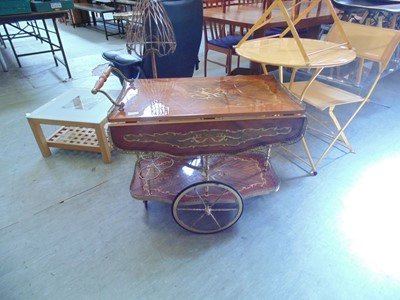 Lot 111 - A 1960s Italian style two tier drinks trolley...