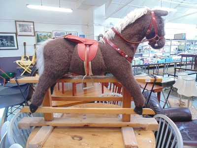 Lot 117 - A modern rocking horse on pine base by Pegasus