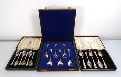 Lot 426 - A set of six silver fleur-de-lis teaspoons,...