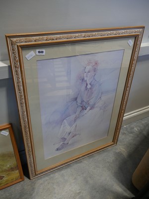 Lot 1049 - 2 framed prints, 1 of a young lady sitting on...