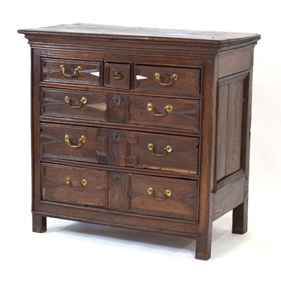 Lot 36 - An 18th century oak chest, converted from a...