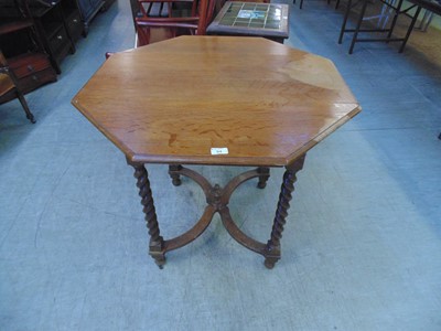 Lot 94 - An early 20th century oak octagonal table