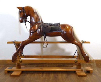 Lot 21 - A Terry White wooden rocking horse on a twin...