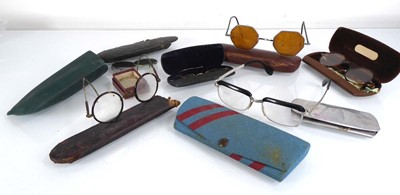 Lot 62 - A collection of vintage clothing, spectacles...