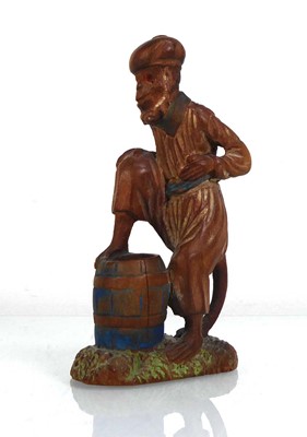 Lot 115 - A late 19th/early 20th century carved figure...