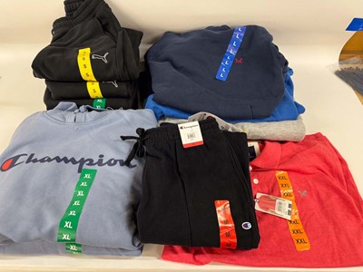 Lot 3860 - 13x items branded clothing by Puma, Champion,...