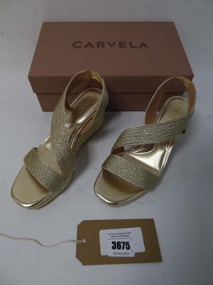 Lot 3675 - Boxed pair of ladies Carvela wedges, gold, EU 38