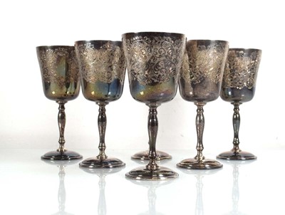 Lot 470 - A set of six engraved silver goblets, maker...