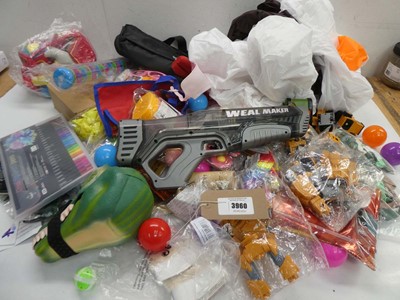 Lot 3960 - Large bag of novelty toys, blow up Snowman,...