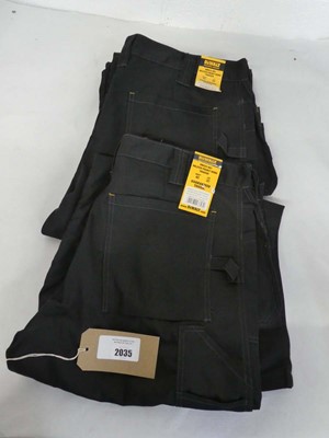 Lot 2 pairs of men's Dewalt holster pocket work...