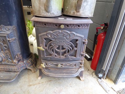 Lot 4265 - Cast iron log burner with 3 assorted flume...