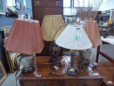 Lot 5090 - Three floral patterned Oriental table lamps...