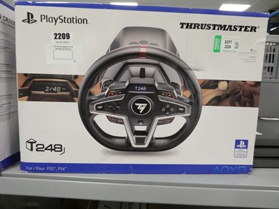 Lot 2209 - Thrust Master T248 steering wheel and pedals...